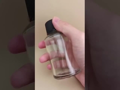 Delikatny design, przezroczysta, gładka, okrągła szklana butelka ze specjalną pokrywką na lekarstwa