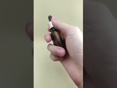 Delikatny projekt Mała, przejrzysta, brązowa, gładka, okrągła butelka do pielęgnacji skóry