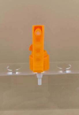 Pomarańczowy plastikowy minispryskiwacz spustowy do fryzjerstwa