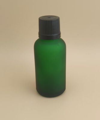 Delikatny design, matowa, przezroczysta, ciemnozielona, gładka szklana butelka na esencję